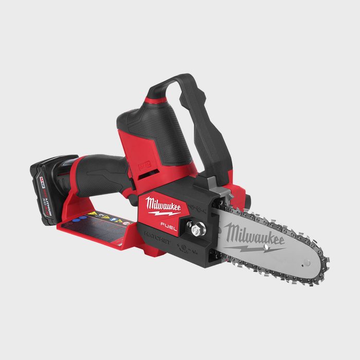 A battery-operated chainsaw tool with a red and black design sits on a light gray background, featuring a sharp chain and safety features for cutting.