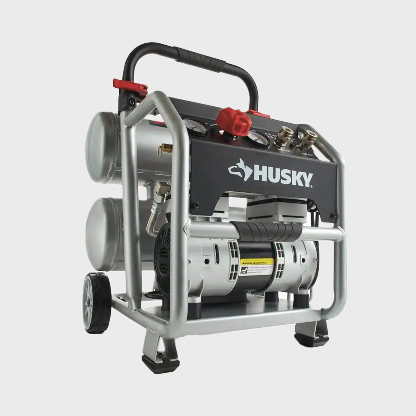 A portable air compressor stands on wheels, with a black and silver body, red controls, and gauges, designed for various pneumatic tasks in home or workshop settings.