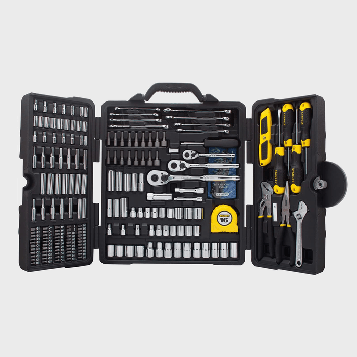 A black tool case opens to reveal an organized assortment of various wrenches, sockets, screwdrivers, and a tape measure, all neatly arranged for accessibility.