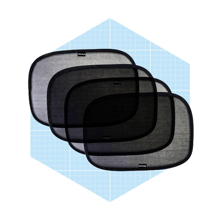 A set of four mesh screening panels is stacked, with varying shades of gray and black. They are displayed against a light blue grid background.