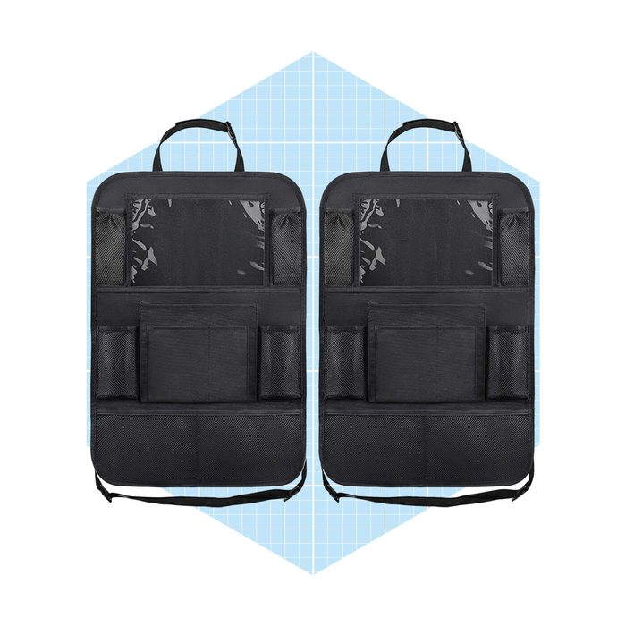 Two black organizational bags are displayed side by side, featuring multiple pockets and transparent sections, set against a light blue grid background.