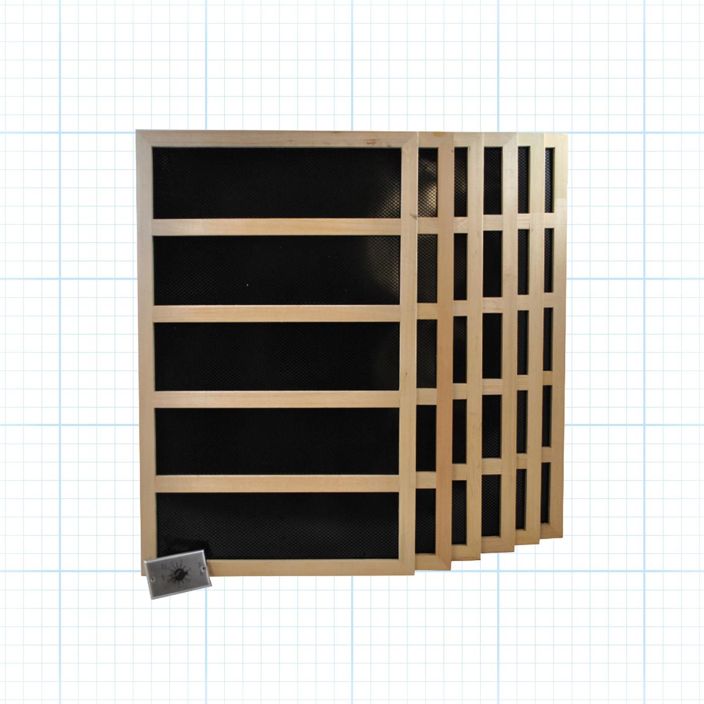 Four wooden frames with black mesh are arranged together, while a small rectangular object lies nearby on a grid-patterned background.