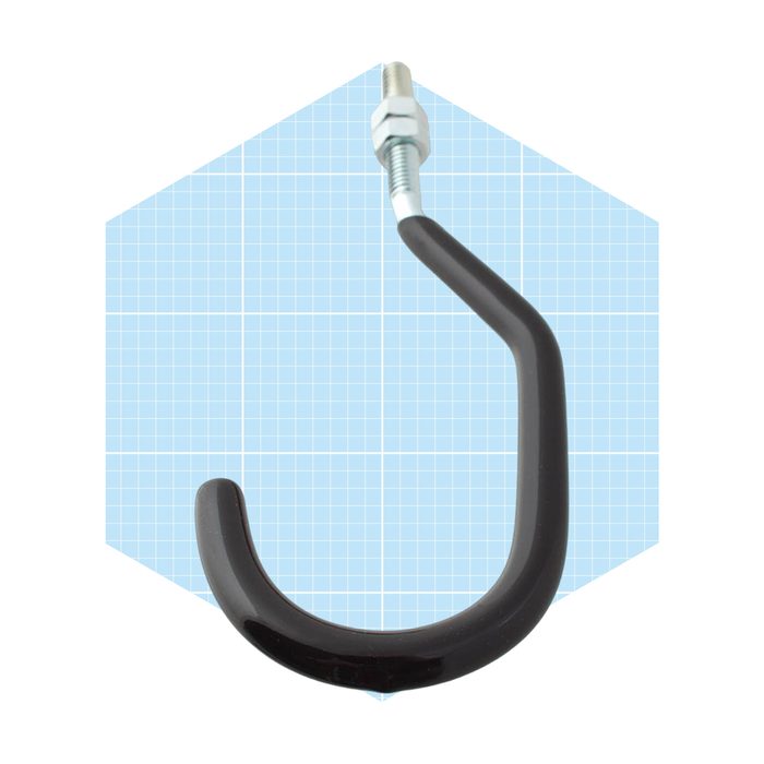 A black metal hook is prominently displayed, attached to a threaded bolt, set against a light blue grid background.