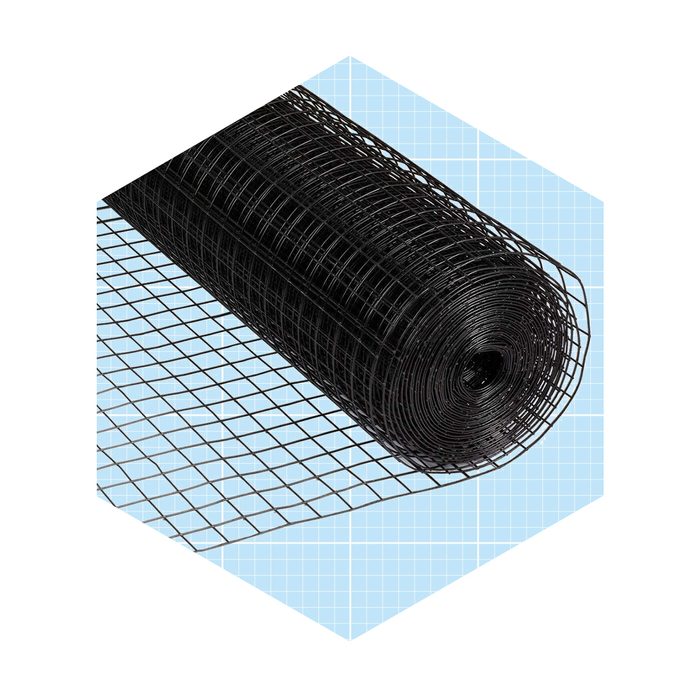 A rolled black wire mesh is positioned on a light blue grid background, displaying its cylindrical form and fine grid pattern.