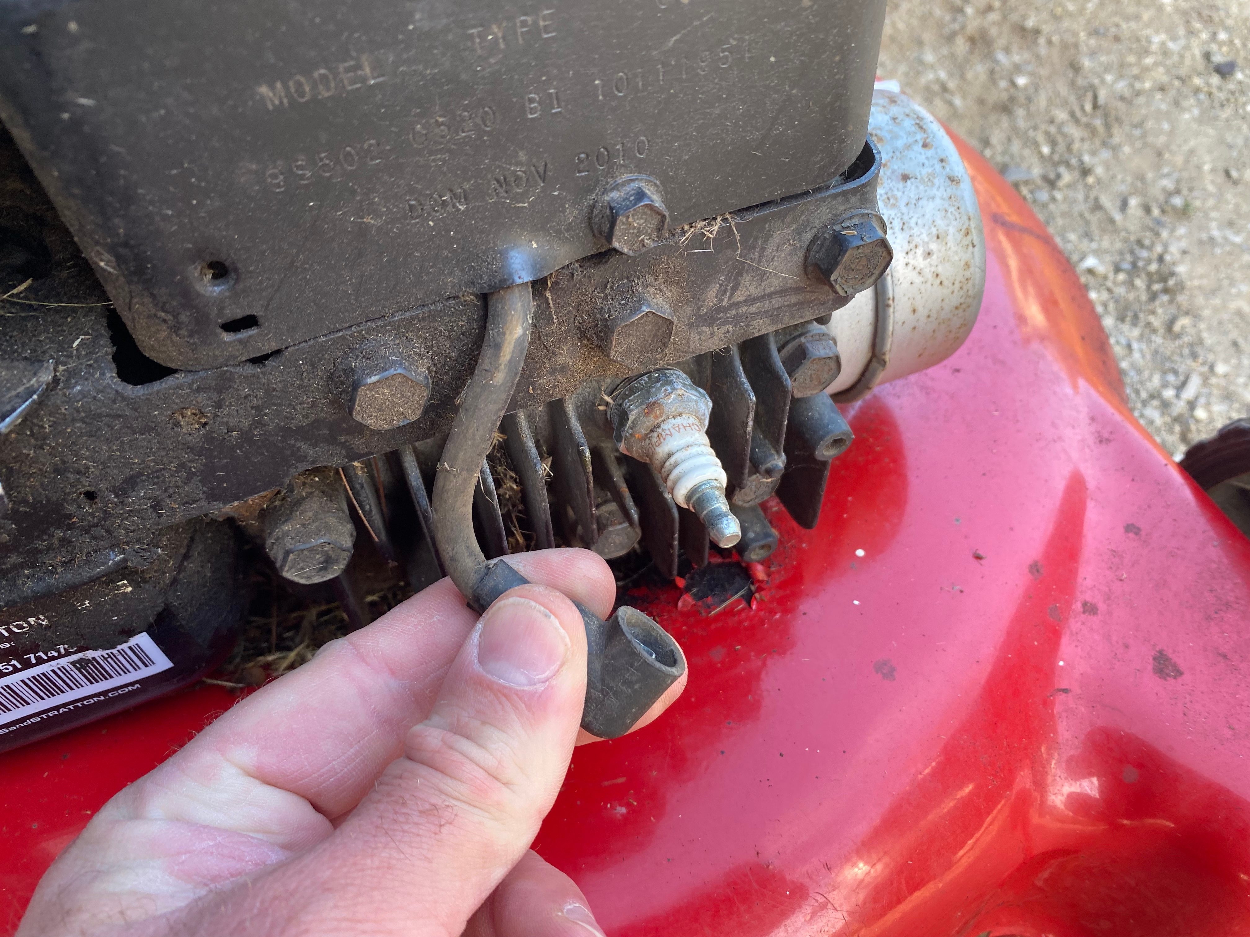 Locate and disconnect the spark plug wire