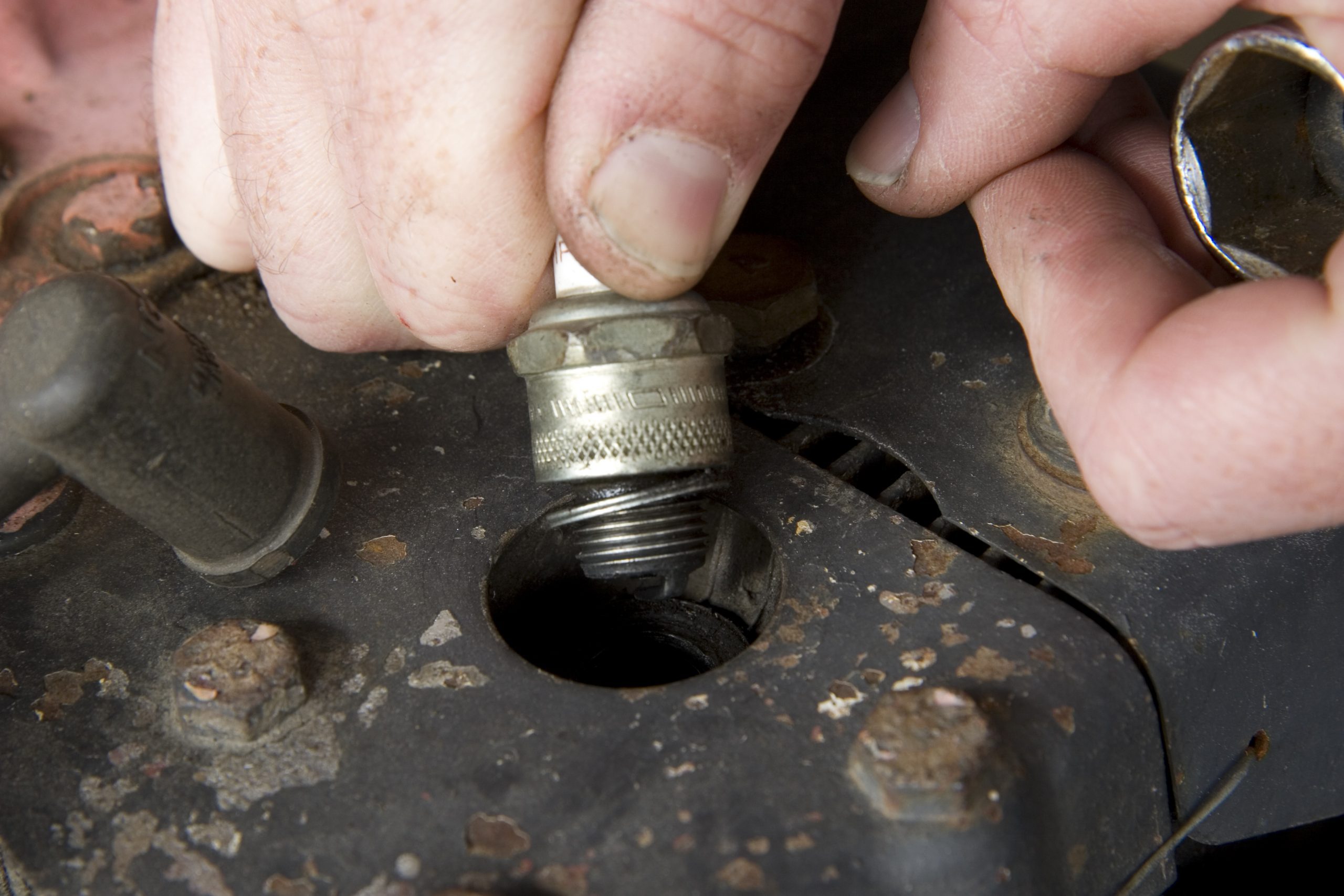 How To Remove a Spark Plug From a Lawn Mower