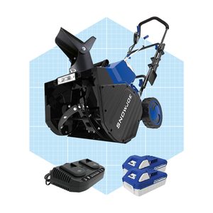 A snow blower is positioned centrally, designed for clearing snow. Two blue batteries and a charger are nearby, set against a light grid background.