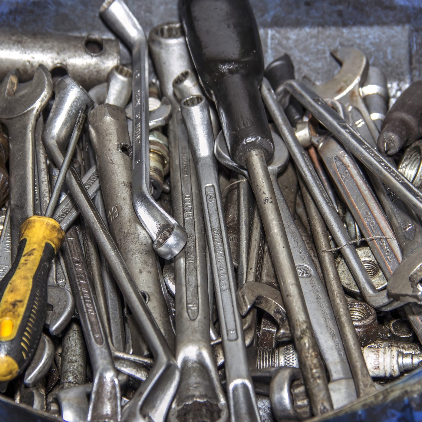Bunch of messy tools in a garage