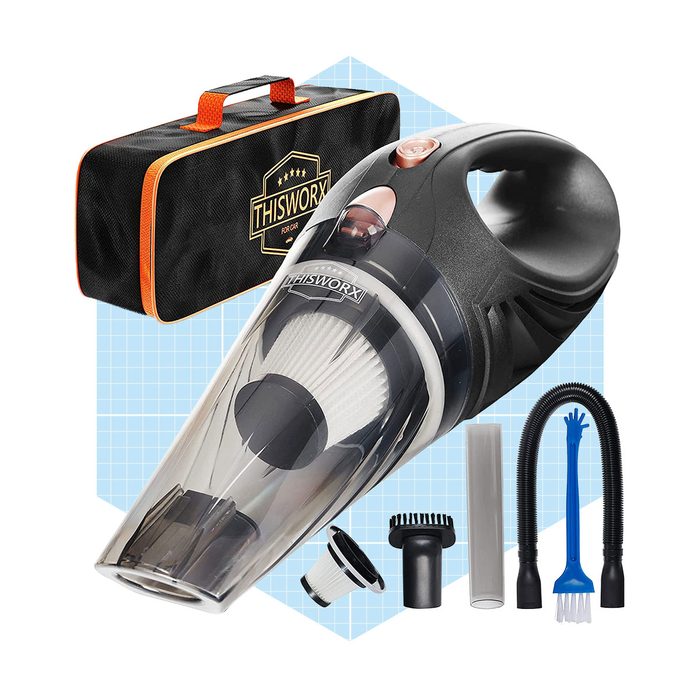 A handheld vacuum cleaner is displayed alongside various cleaning attachments and a carrying case, set against a light blue geometric background.