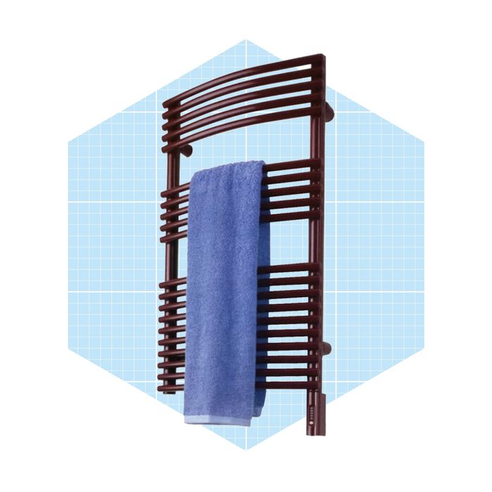A brown towel rack holds a blue towel, displaying a modern design against a light blue grid background.