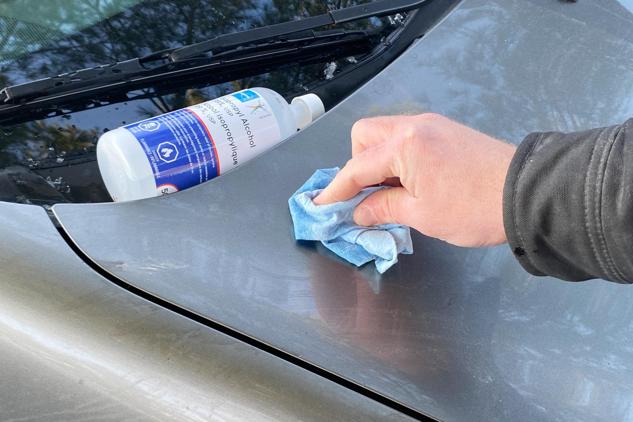using rubbing alcohol and a blu rag to wipe the sap spot
