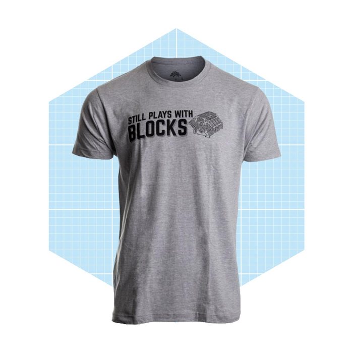 A gray t-shirt features the phrase 