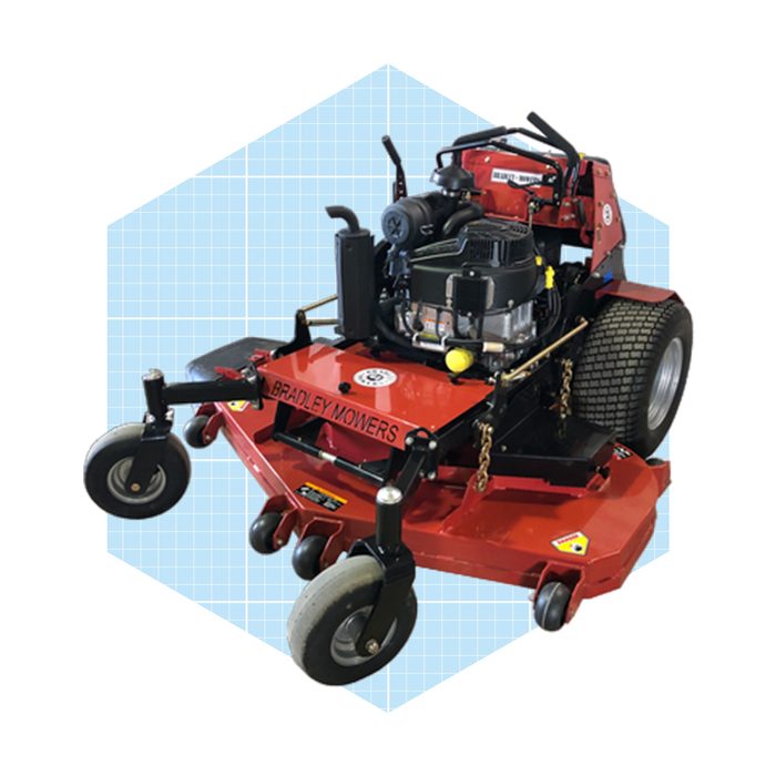 A red lawn mower with four wheels and a powerful engine is positioned on a light blue grid background, designed for efficient grass cutting.