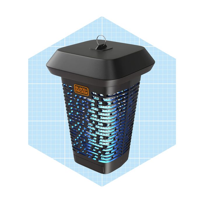 A black insect trap emits blue light, capturing insects, within a geometric light blue background. A handle is attached for easy placement.