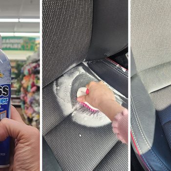 A bottle of glass cleaner is held while scrubbing stained car upholstery, revealing cleaner fabric in a bright, well-lit environment.