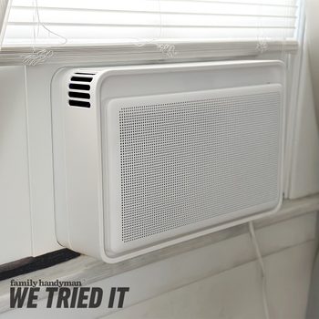 A white heating unit is mounted on a wall near a window, quietly blending into the room's design while providing warmth.