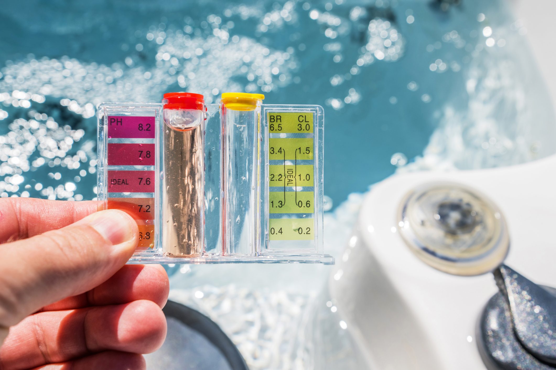 Hot Tub Water Quality Check by Using Chemical Testing Kit.