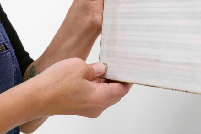 installing picture frame hooks on the back of the frame