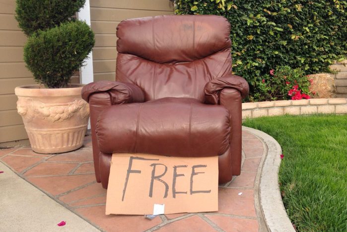 Free leather recliner in front of nice home