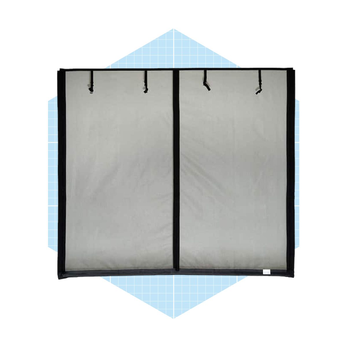 A gray two-panel divider stands upright, secured by black straps. It features a sleek design, set against a light blue grid-patterned background.
