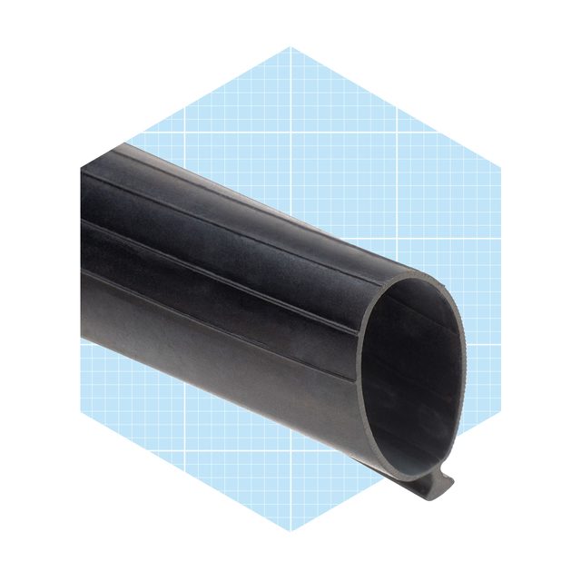 A black rubber tube with a smooth exterior and open end rests against a blue grid background, suggesting it’s meant for industrial or mechanical use.