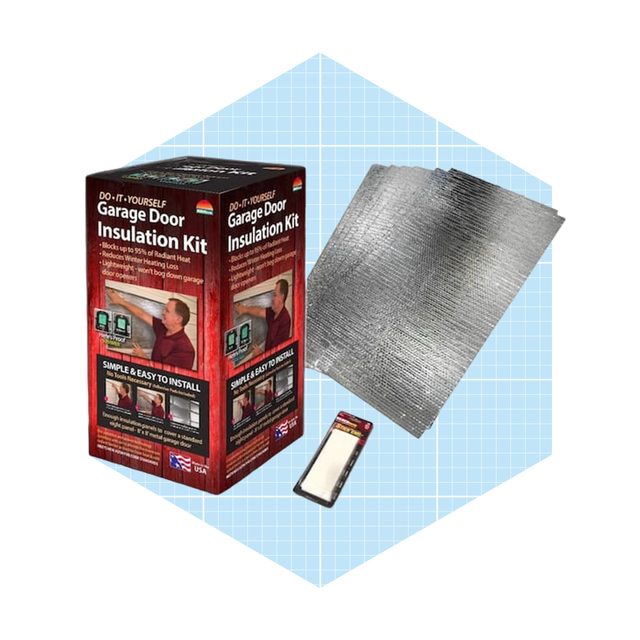 A garage door insulation kit sits in an upright box, featuring reflective material and a small adhesive piece, against a light blue grid background.