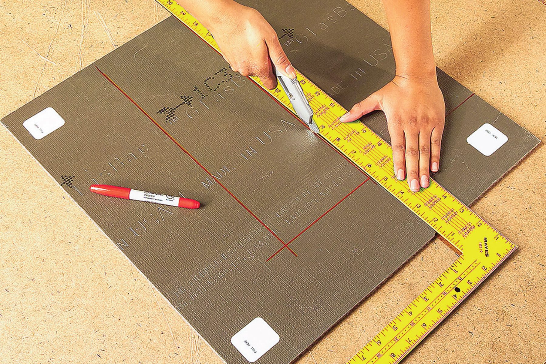 How To Install Carpet Tiles Close up of carpet tile adhesive