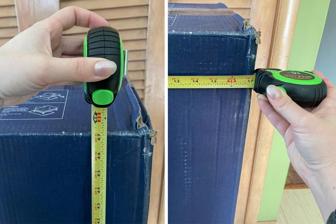 A woman measuring the mattress box through measuring tape