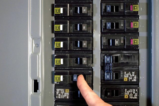 finger turning off breaker
