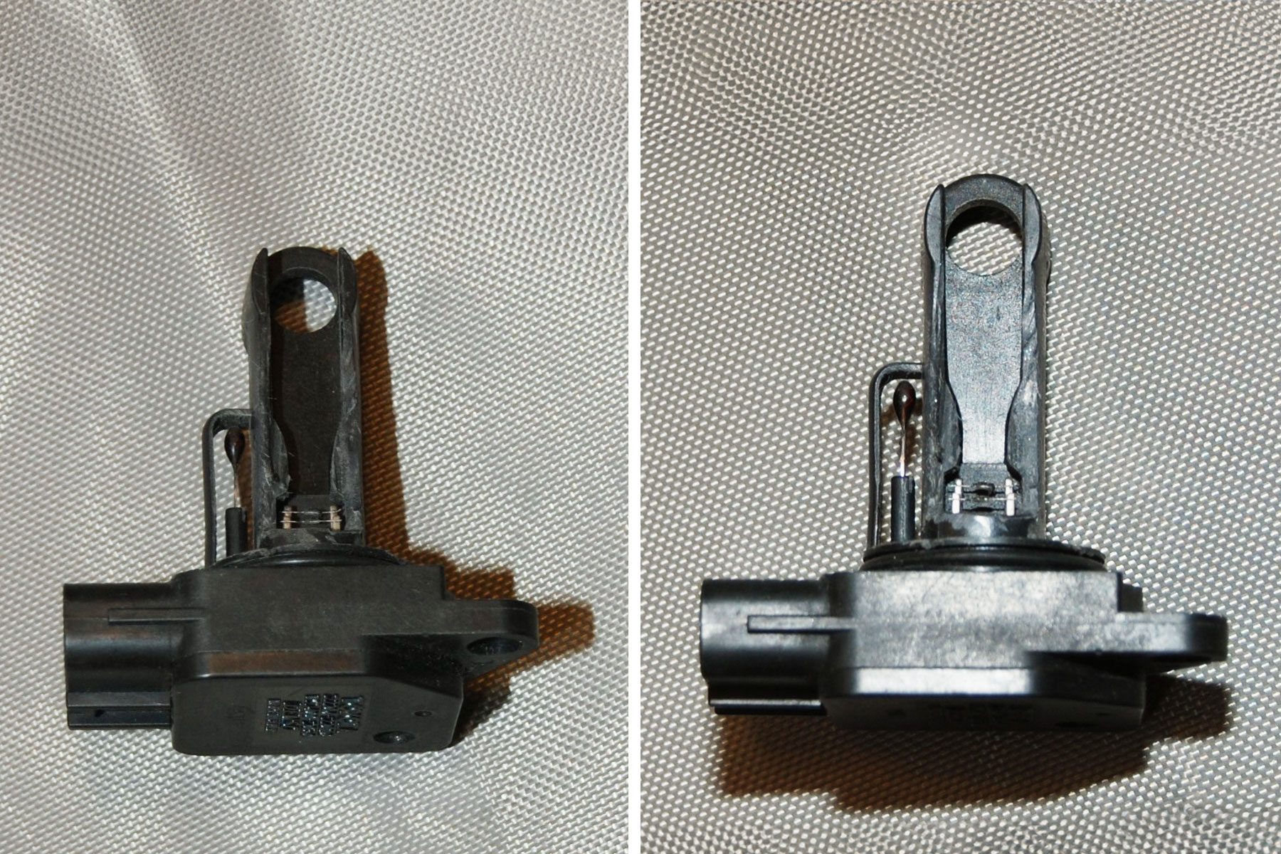 Black Mass Air Flow Sensor place on a surface