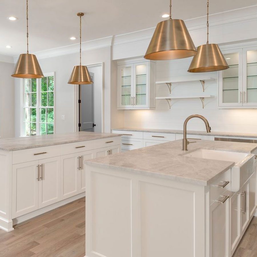 Modern Double Island Kitchen with large windows and lamps