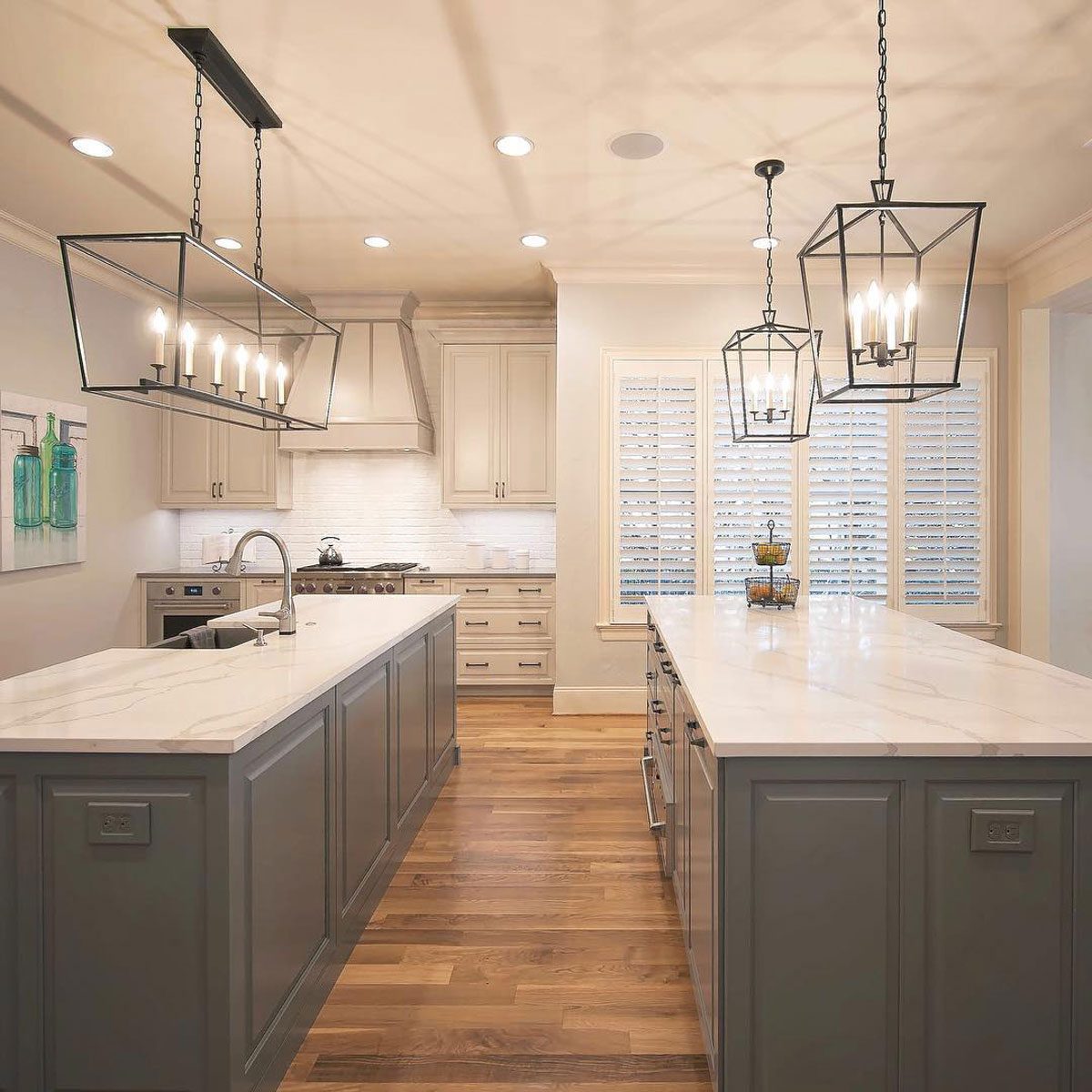 Kitchen space with two grey counters and warm lights