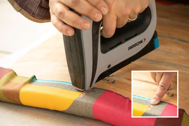 Position new fabric and staple