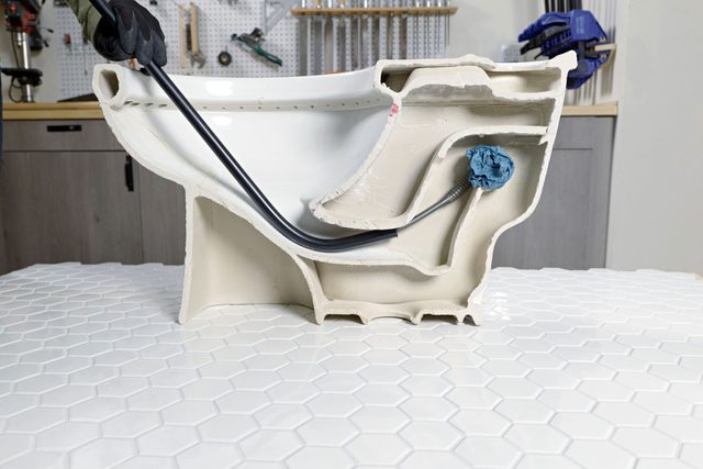 Locate Clog In The Toilet With Snake