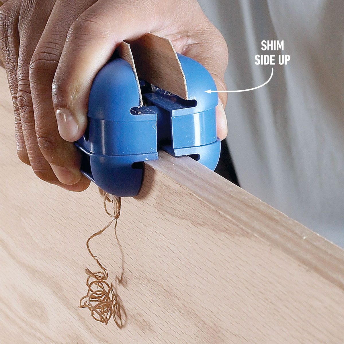 How To Apply Iron On Veneer Edging Use a Trimmer on the Edges showing shim side up