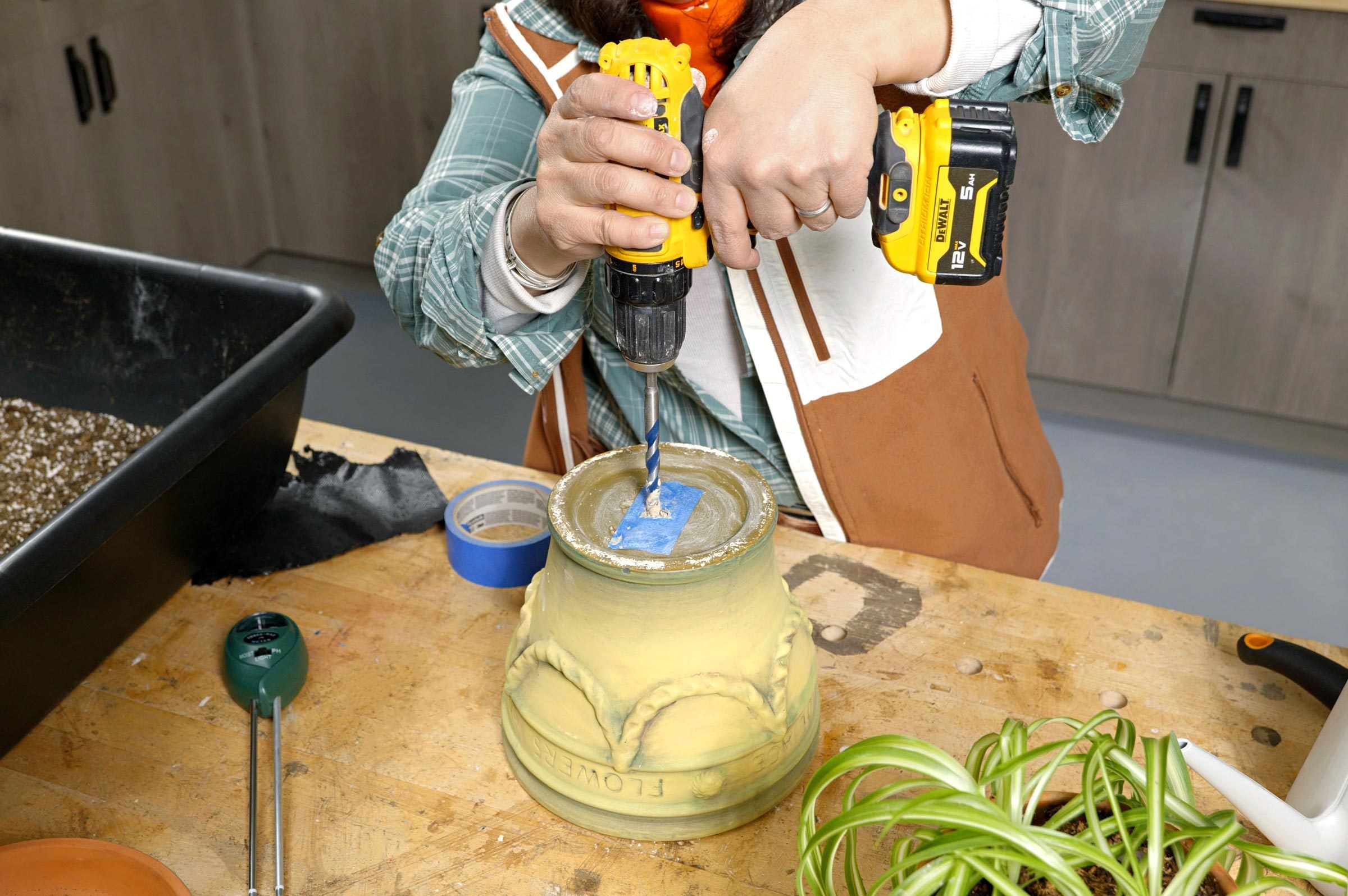drilling hole in the bottom of a planter