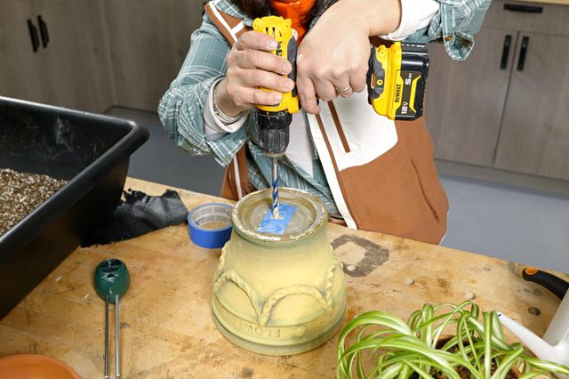 drilling hole in the bottom of a planter