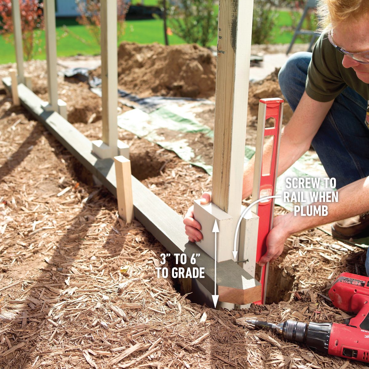 How To Build A Privacy Screen On Your Patio Dig the Holes and Set the Posts