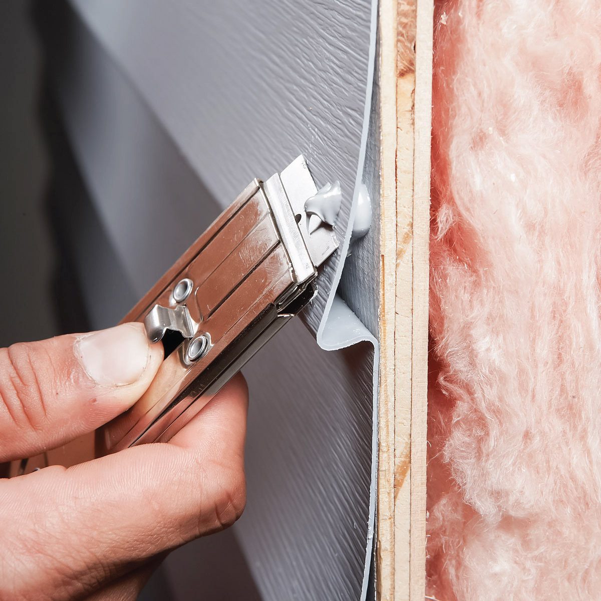 This Is the Easiest Way to Repair Small Holes in Siding