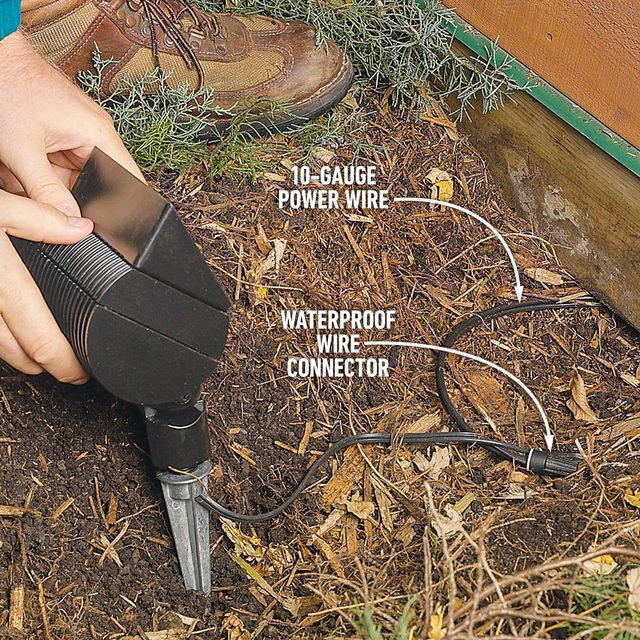 How To Install Low Voltage Deck Lighting Stake the floodlights