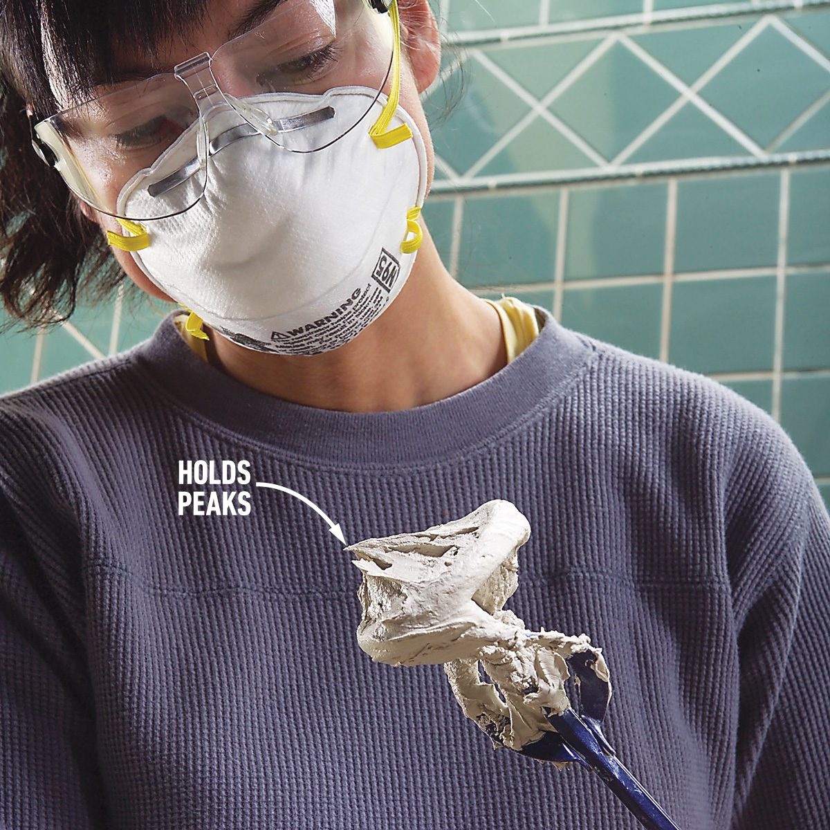 Slice out caulk and scratch out grout