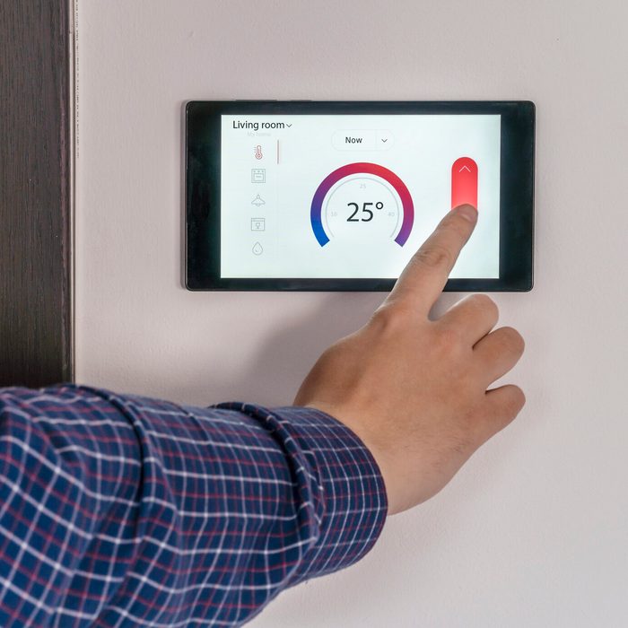 Smart home climate control device on a wall