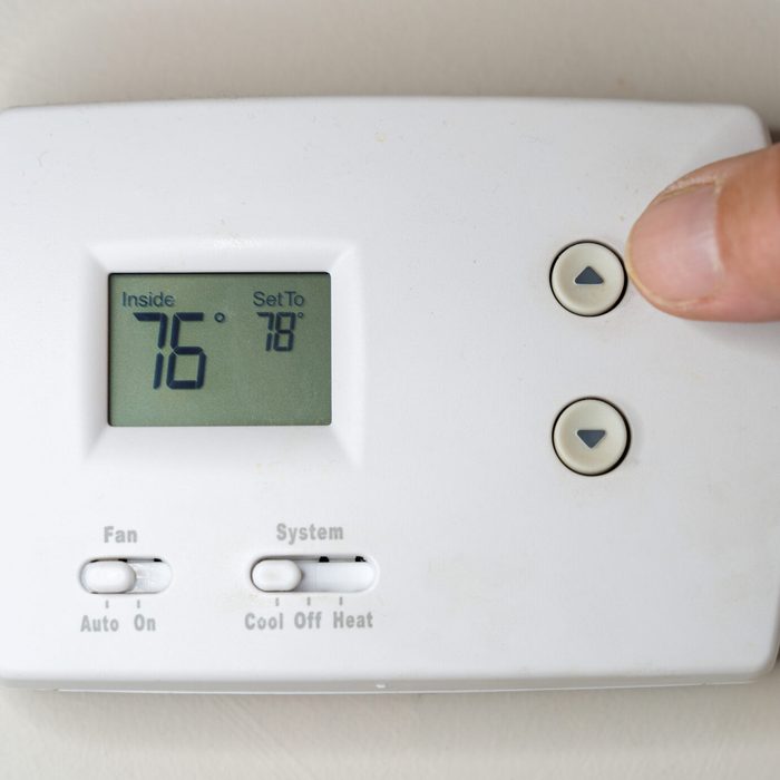 Adjusting the Thermostat on the Air Conditioner to Save Money