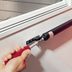 Here's Why Your Storm Door Closer Has Two Screw Holes