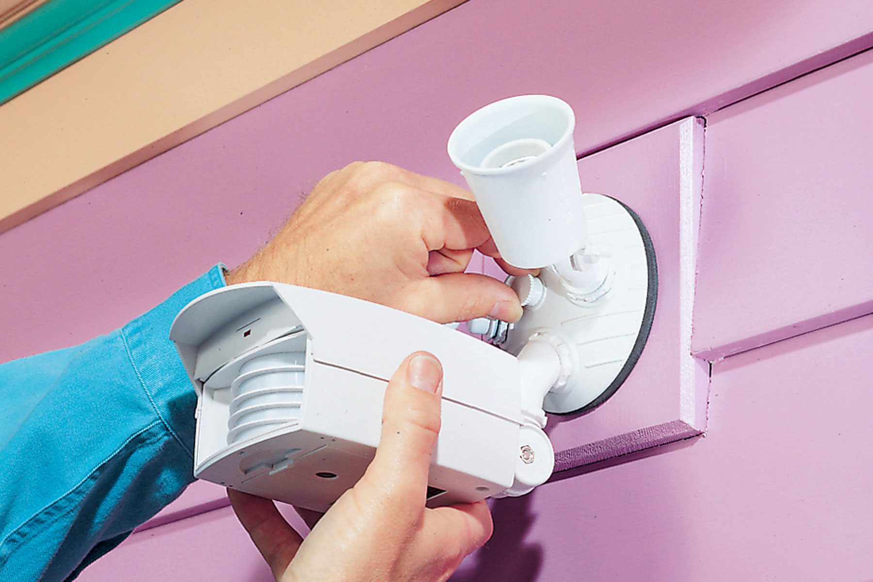 fixture screwed to the crossbar using the screws.