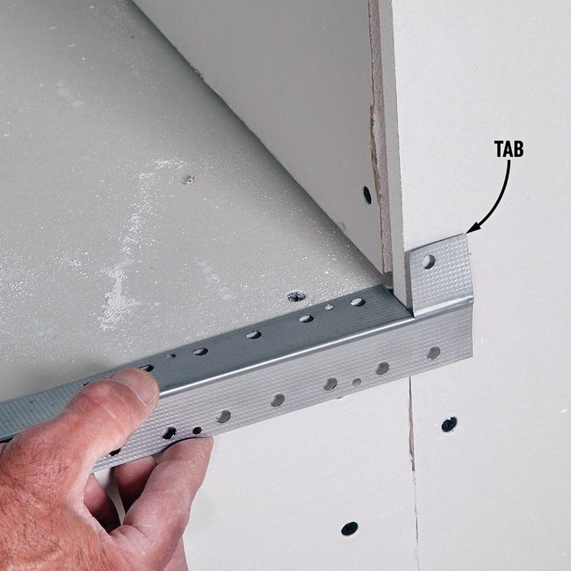 How To Make A Built In Bookcase That Surrounds Your Television Nail on the top and bottom corner beads