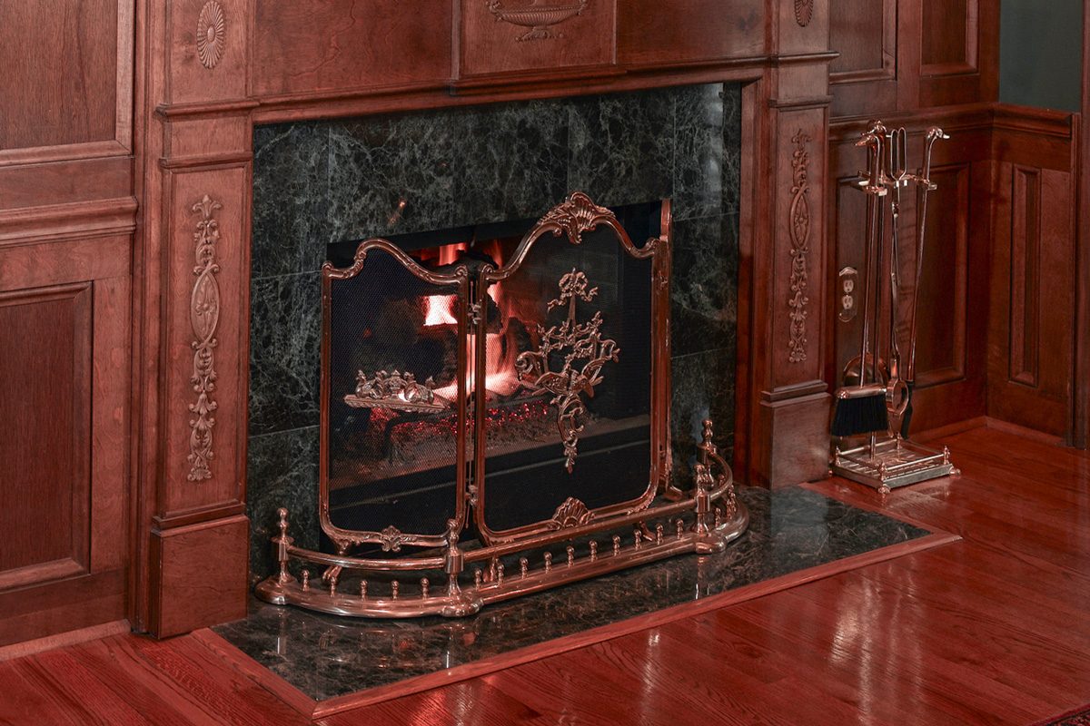 mantle and fireplace made of cherry wood