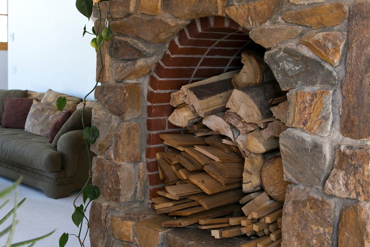 fireplace filled with wood