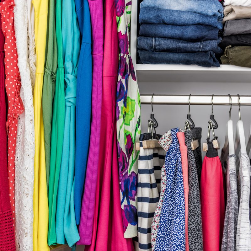 organised clothes in closet