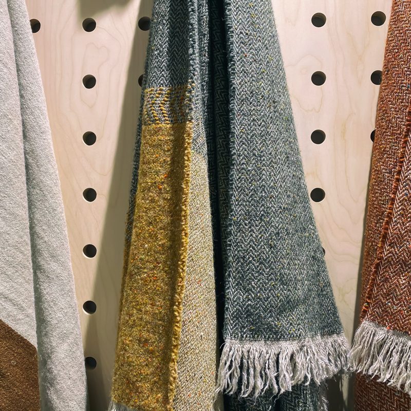 scarves on pegboard